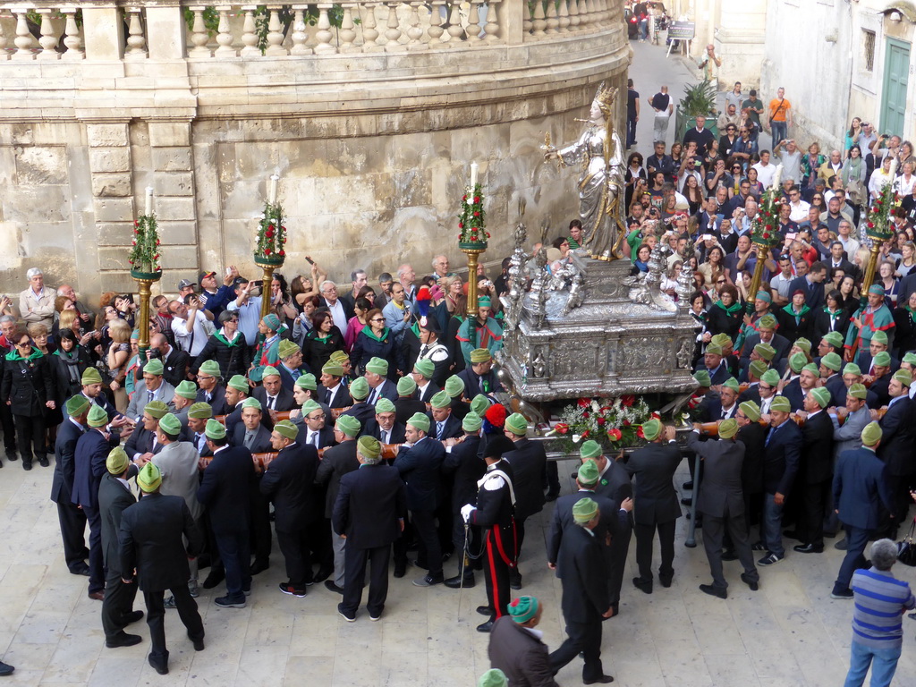 Statue of St. Lucy carried around in the procession during the feast of St. Lucy at the Piazza Duomo Square, viewed from the balcony of the Palazzo Borgia del Casale palace