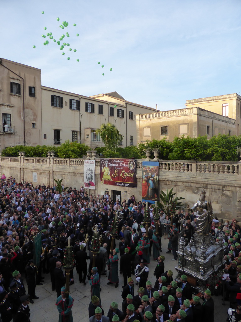 Balloons being released from the Archbisshop`s See at the Piazza Duomo Square during the feast of St. Lucy, viewed from the balcony of the Palazzo Borgia del Casale palace