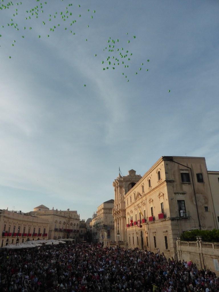 Balloons being released from the Archbisshop`s See at the Piazza Duomo Square during the feast of St. Lucy, viewed from the balcony of the Palazzo Borgia del Casale palace