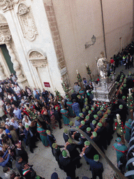 Statue of St. Lucy carried around in the procession during the feast of St. Lucy at the Via Pompeo Picherali street, viewed from the balcony of the Palazzo Borgia del Casale palace