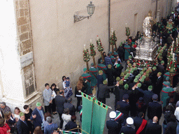Relics and statue of St. Lucy carried around in the procession during the feast of St. Lucy at the Via Pompeo Picherali street, viewed from the balcony of the Palazzo Borgia del Casale palace