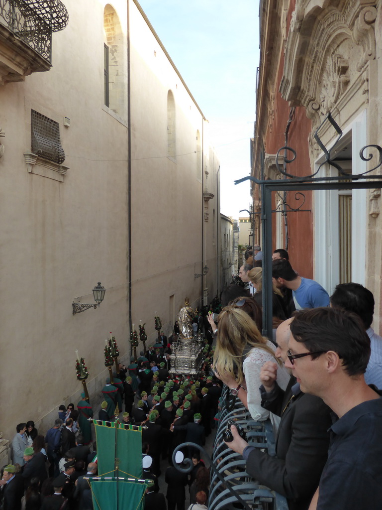 Statue of St. Lucy carried around in the procession during the feast of St. Lucy at the Via Pompeo Picherali street, viewed from the balcony of the Palazzo Borgia del Casale palace