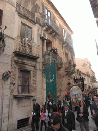 People carrying banners at the procession during the feast of St. Lucy at the Via Castello Maniace street