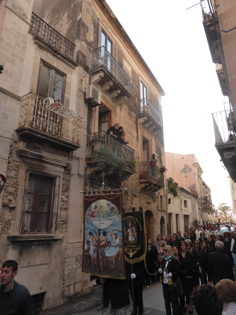 People carrying banners at the procession during the feast of St. Lucy at the Via Castello Maniace street