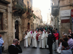 Priests and the relics and statue of St. Lucy carried around in the procession during the feast of St. Lucy at the Via Castello Maniace street