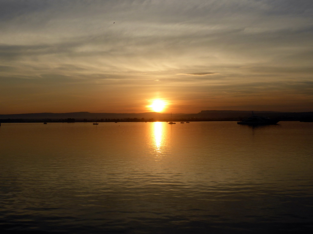 Sunset at the Porto Grande harbour, viewed from the Lungomare Alfeo street