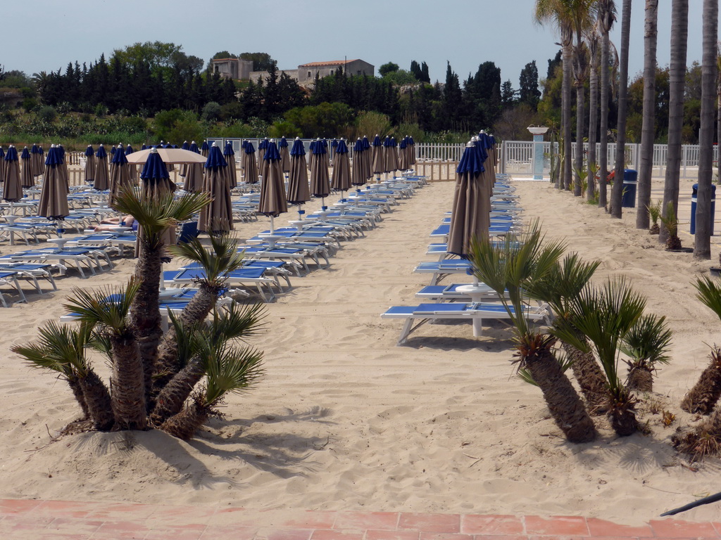 Sun chairs at the Lido Sayonara beach at the village of Fontane Bianche