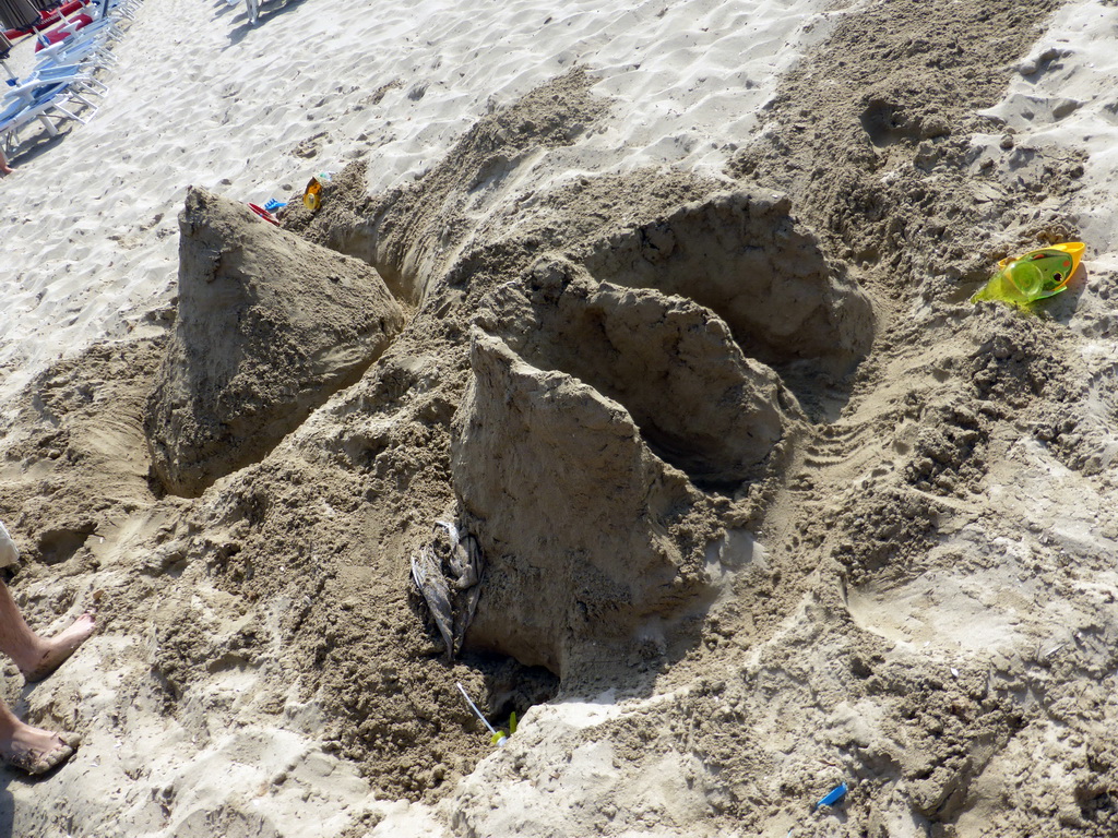 Letters in the sand at the Lido Sayonara beach at the village of Fontane Bianche