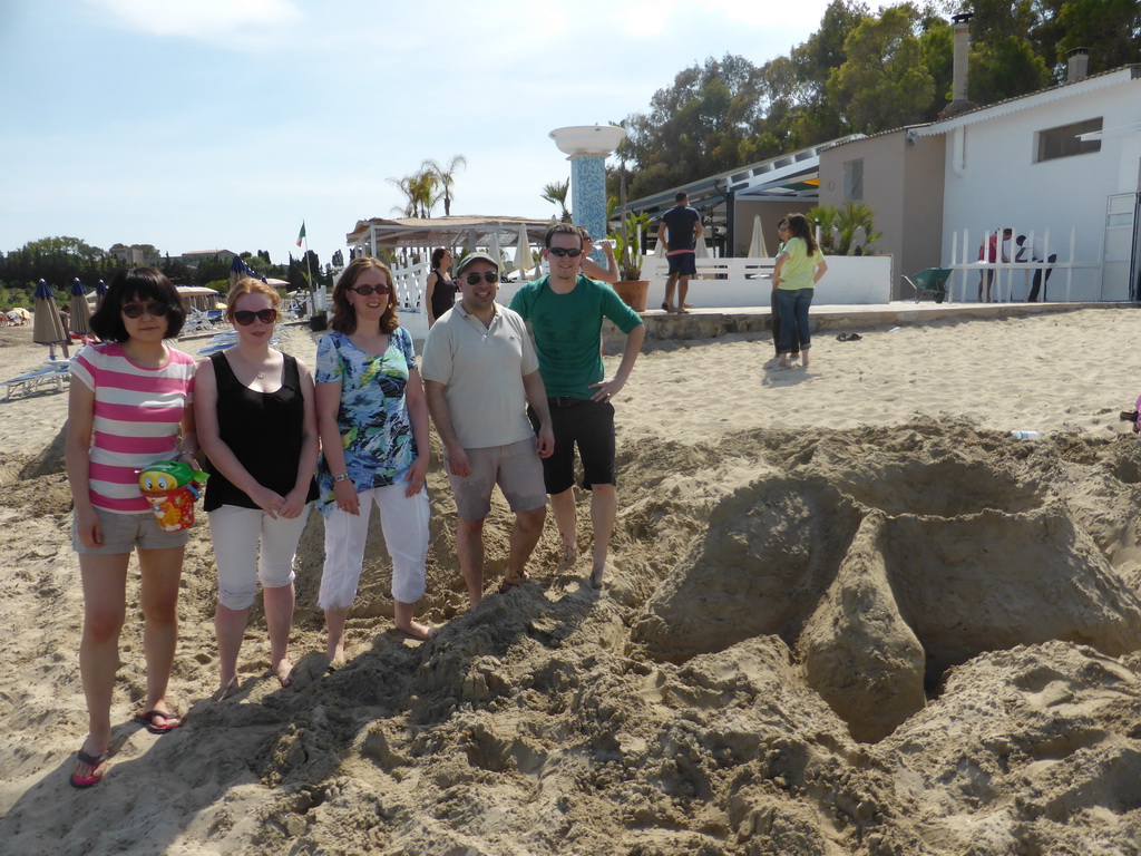 One of the teams with the letter `R` in the sand at the Lido Sayonara beach at the village of Fontane Bianche