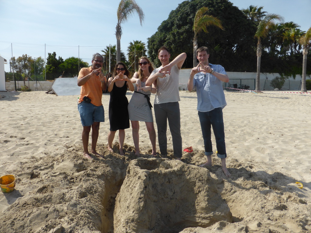 Tim and his team with the letter `A` in the sand at the Lido Sayonara beach at the village of Fontane Bianche