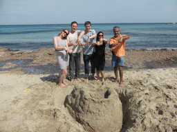 Tim and his team with the letter `A` in the sand at the Lido Sayonara beach at the village of Fontane Bianche