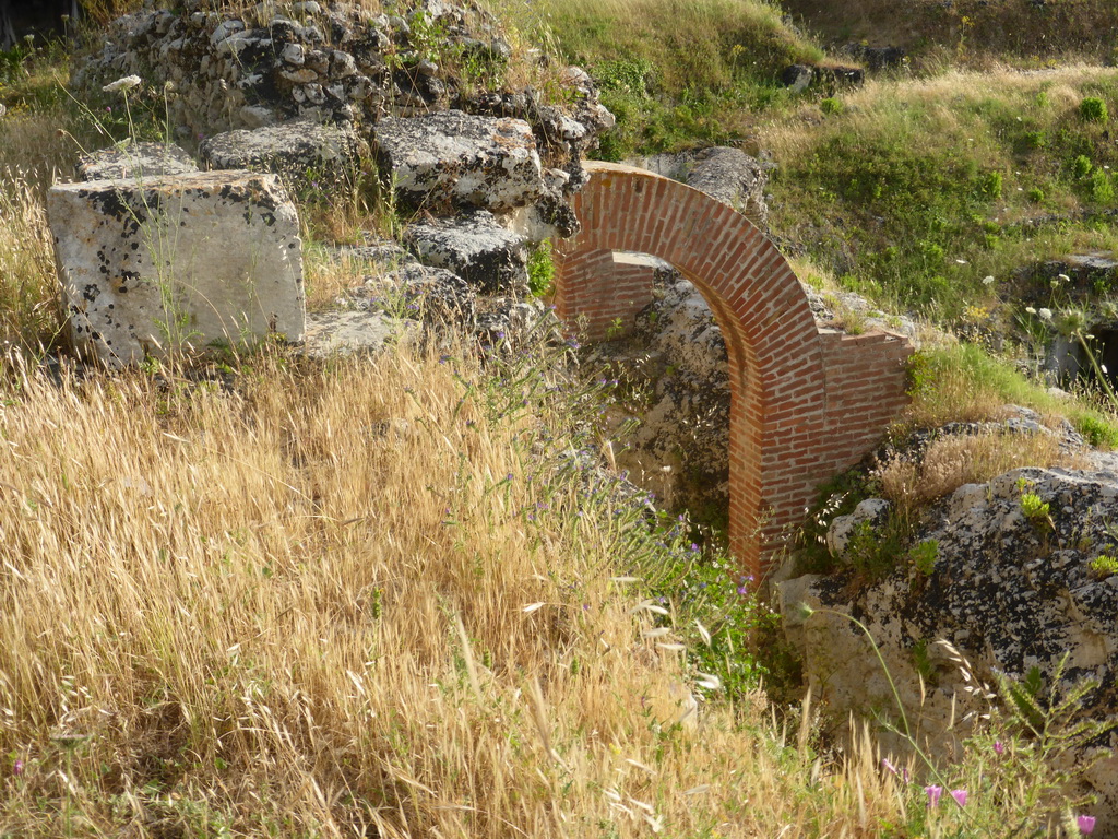 Arch at the east side of the Roman Amphitheatre at the Parco Archeologico della Neapolis park