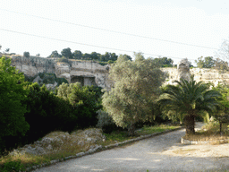 The Latomia del Paradiso quarry at the Parco Archeologico della Neapolis park, viewed from the Viale Paradiso street