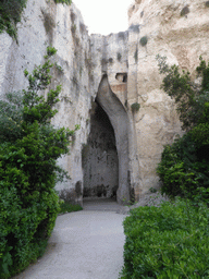 The entrance to the Orecchio di Dionisio cave at the Latomia del Paradiso quarry at the Parco Archeologico della Neapolis park