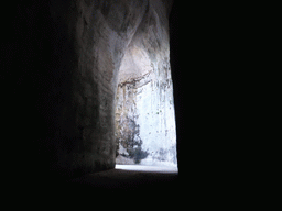 Entrance to the Orecchio di Dionisio cave at the Latomia del Paradiso quarry at the Parco Archeologico della Neapolis park, viewed from within