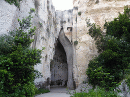 The entrance to the Orecchio di Dionisio cave at the Latomia del Paradiso quarry at the Parco Archeologico della Neapolis park