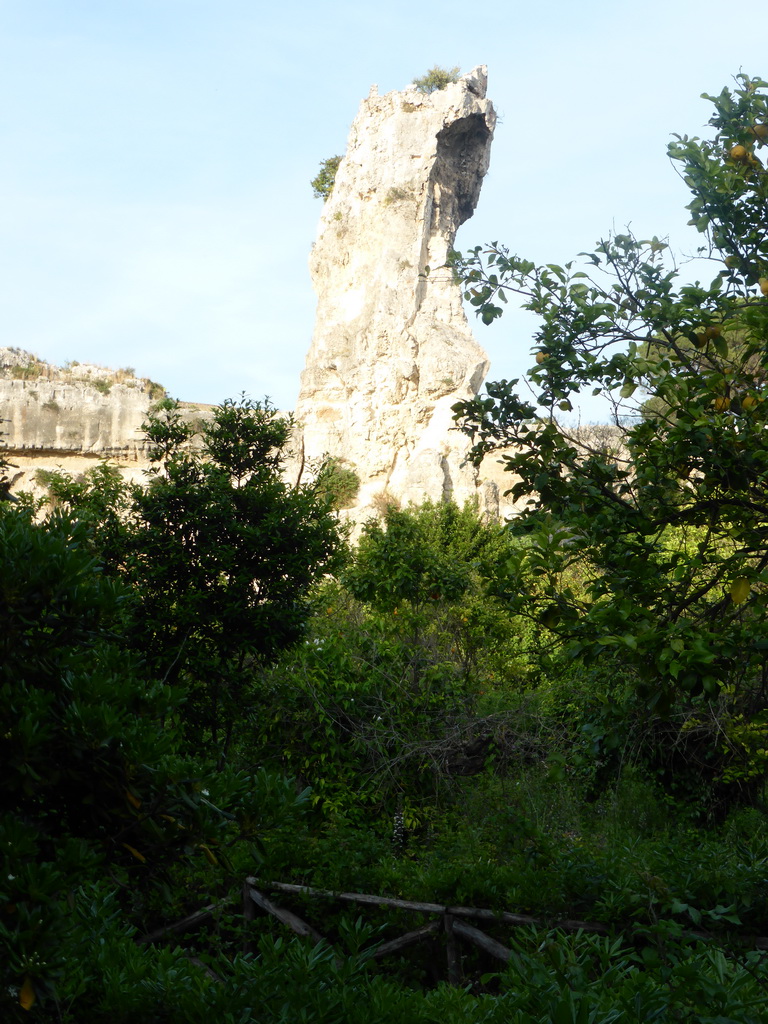 Large rock at the Latomia del Paradiso quarry at the Parco Archeologico della Neapolis park