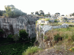 East side of the Latomia del Paradiso quarry at the Parco Archeologico della Neapolis park, viewed from the Via Ettore Romagnoli street