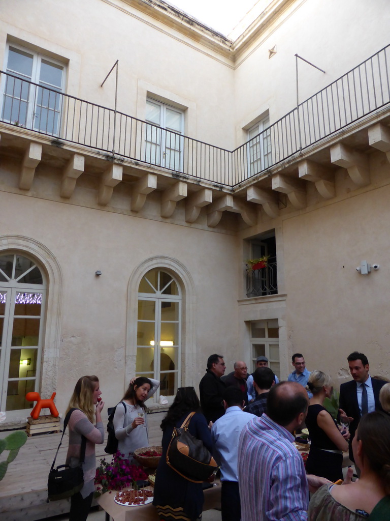 Course participants at the Wine and Cheese event at the Inner Square of the Impact Hub building at the Via Vincenzo Mirabella street