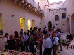 Course participants at the Wine and Cheese event at the Inner Square of the Impact Hub building at the Via Vincenzo Mirabella street