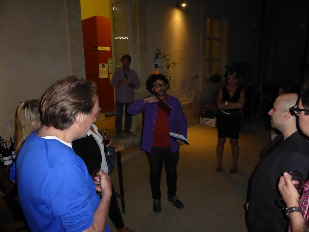 Course participants at the Wine and Cheese event at the Inner Square of the Impact Hub building at the Via Vincenzo Mirabella street