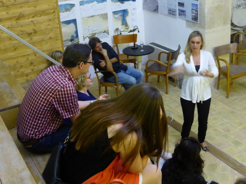 Course participants at the Wine and Cheese event in the Impact Hub building at the Via Vincenzo Mirabella street