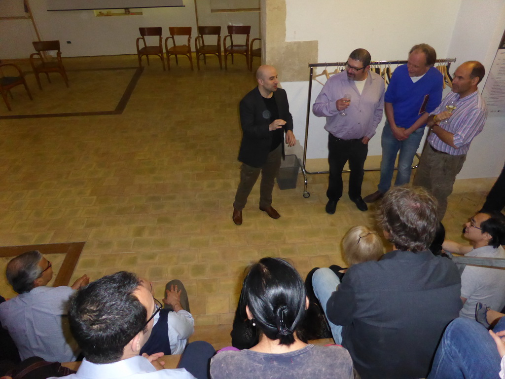 Course participants at the Wine and Cheese event in the Impact Hub building at the Via Vincenzo Mirabella street