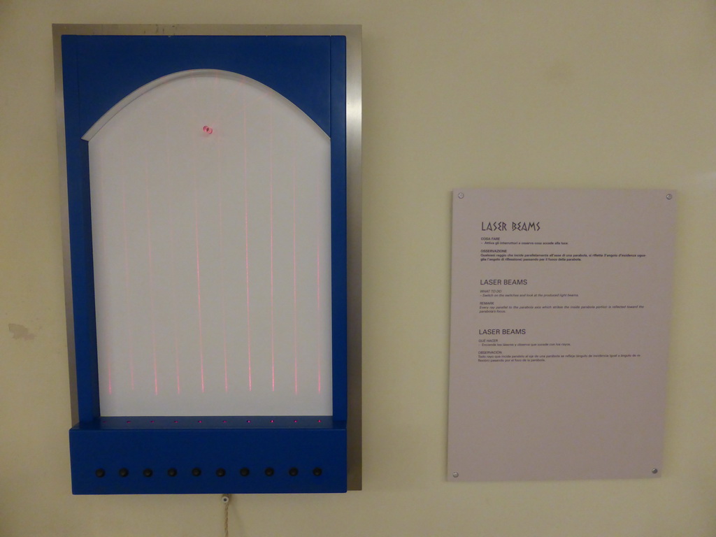 Experimental setup with laser beams at the Museo di Archimede museum, with explanation