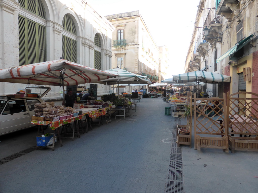 Market stalls with food at the Via Emanuele de Benedictis street