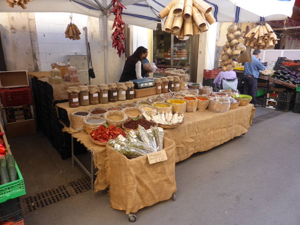Market stall with spices at the Via Emanuele de Benedictis street