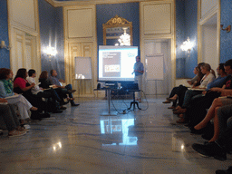 Speaker and course participants at the Hall of Amore and Psyche at the Palazzo Borgia del Casale palace