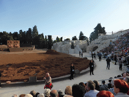 Stage and grandstand of the Greek Theatre at the Parco Archeologico della Neapolis park, shortly before the play `Agamemnon` by Aeschylus