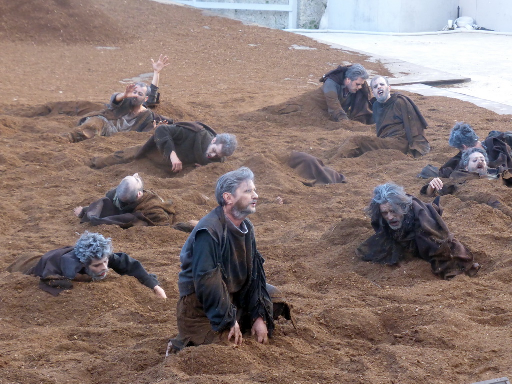 Chorus at the stage of the Greek Theatre at the Parco Archeologico della Neapolis park, during the play `Agamemnon` by Aeschylus