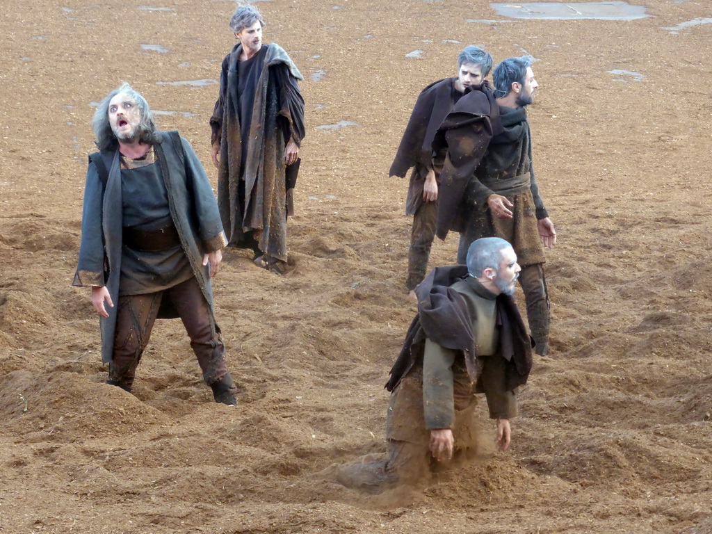 Chorus at the stage of the Greek Theatre at the Parco Archeologico della Neapolis park, during the play `Agamemnon` by Aeschylus