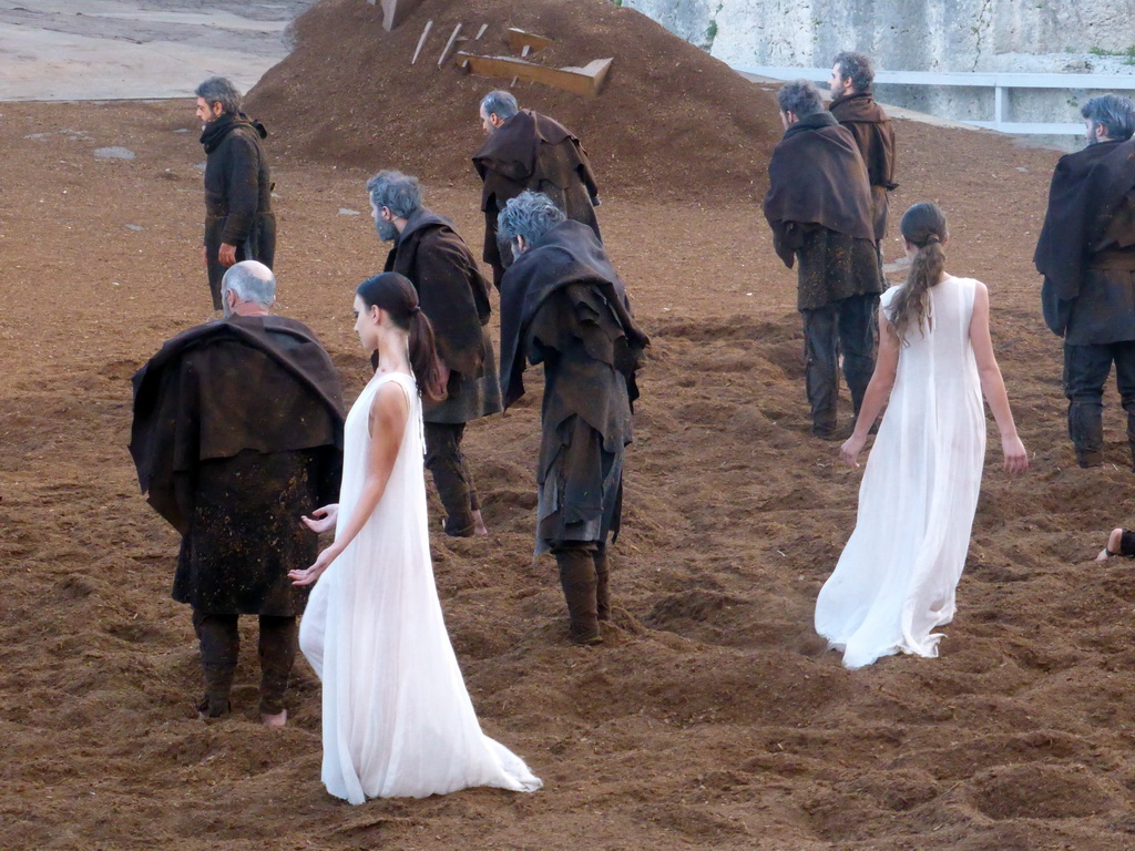 Chorus and female dancers at the stage of the Greek Theatre at the Parco Archeologico della Neapolis park, during the play `Agamemnon` by Aeschylus