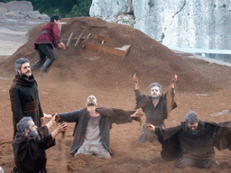 Herald and chorus at the stage of the Greek Theatre at the Parco Archeologico della Neapolis park, during the play `Agamemnon` by Aeschylus