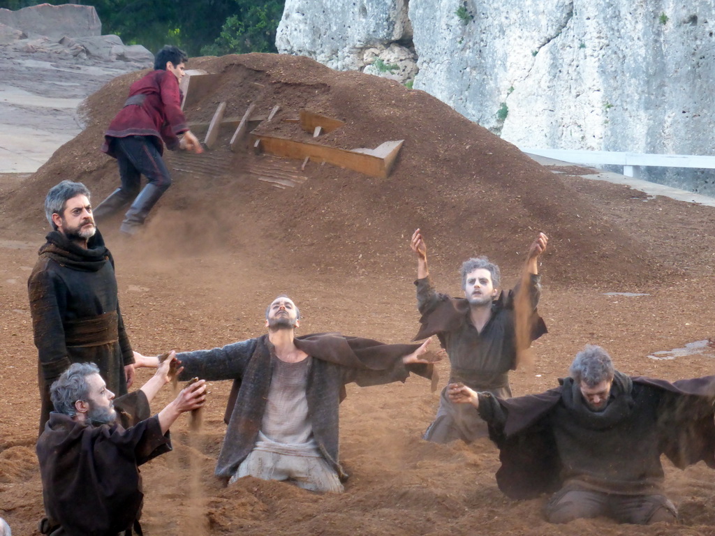 Herald and chorus at the stage of the Greek Theatre at the Parco Archeologico della Neapolis park, during the play `Agamemnon` by Aeschylus