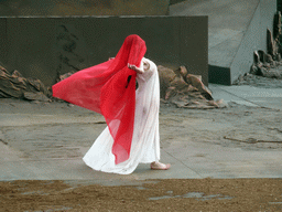 Female dancer at the stage of the Greek Theatre at the Parco Archeologico della Neapolis park, during the play `Agamemnon` by Aeschylus