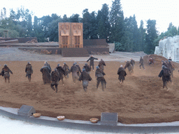 Chorus and the gates of Argos at the stage of the Greek Theatre at the Parco Archeologico della Neapolis park, during the play `Agamemnon` by Aeschylus