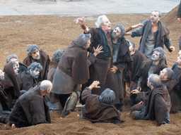 Chorus at the stage of the Greek Theatre at the Parco Archeologico della Neapolis park, during the play `Agamemnon` by Aeschylus