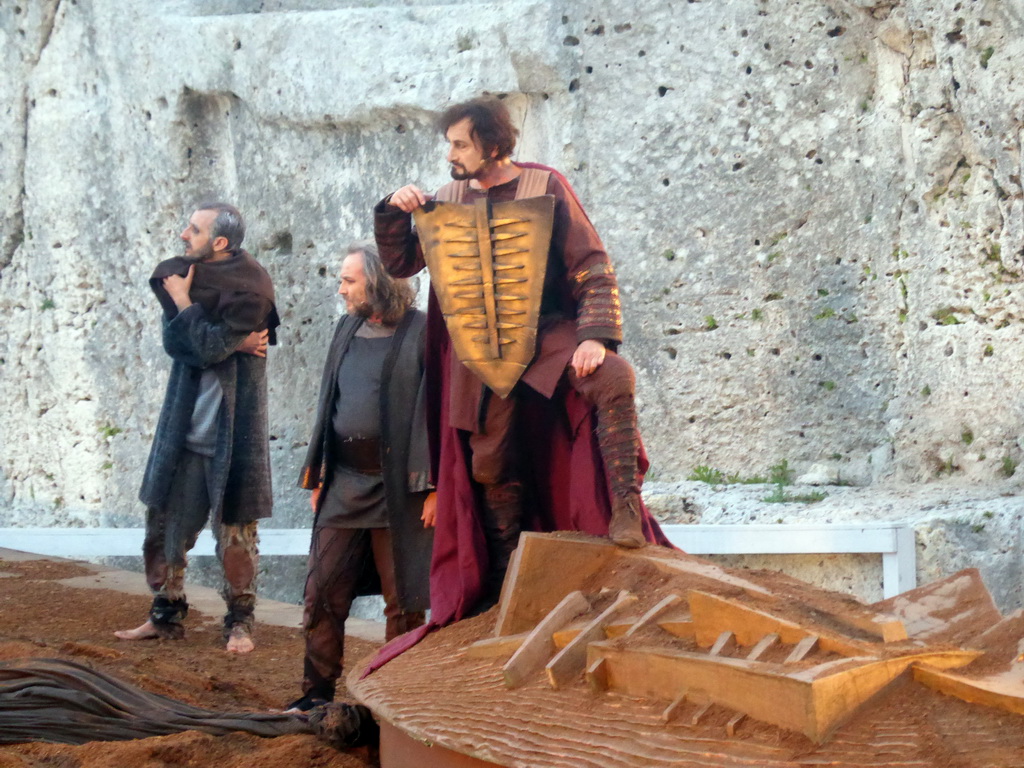 Agamemnon, chorus and boat at the stage of the Greek Theatre at the Parco Archeologico della Neapolis park, during the play `Agamemnon` by Aeschylus