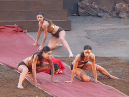 Female dancers with the purple tapestry to the gates of Argos at the stage of the Greek Theatre at the Parco Archeologico della Neapolis park, during the play `Agamemnon` by Aeschylus