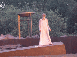 Cassandra and torch at the stage of the Greek Theatre at the Parco Archeologico della Neapolis park, during the play `Agamemnon` by Aeschylus