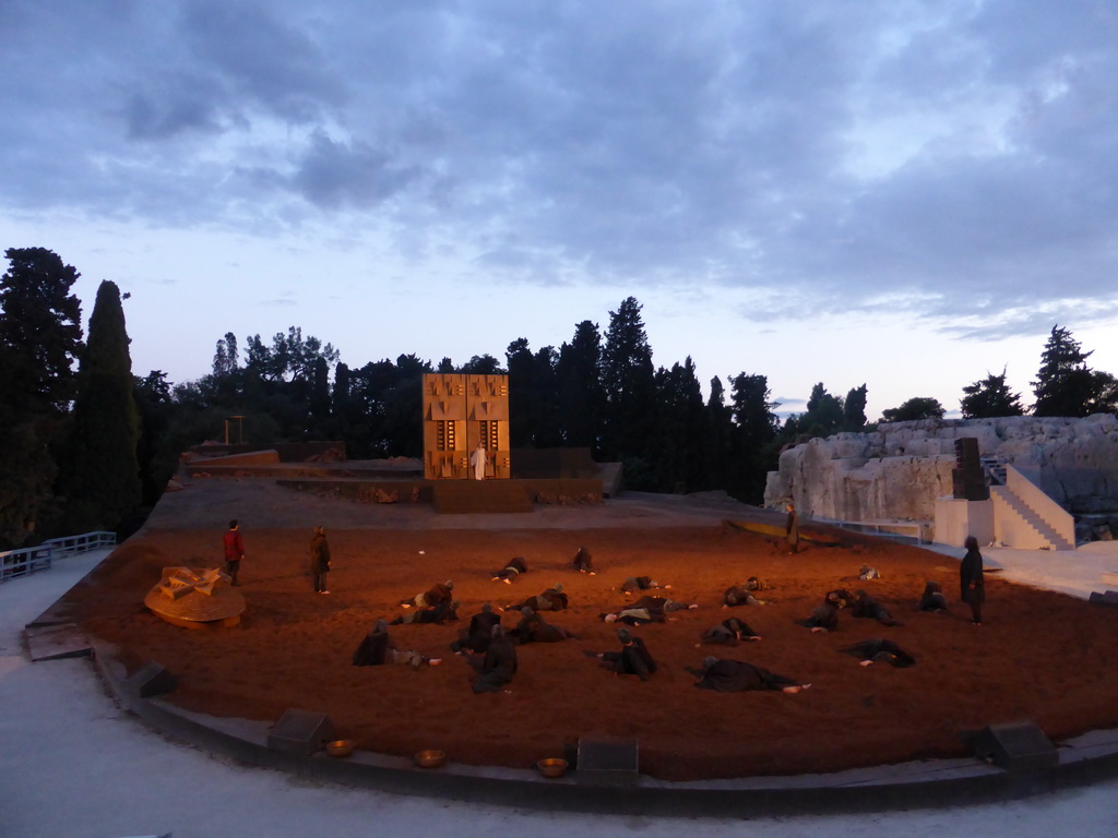 Chorus, herald and Cassandra at the gates of Argos at the stage of the Greek Theatre at the Parco Archeologico della Neapolis park, during the play `Agamemnon` by Aeschylus