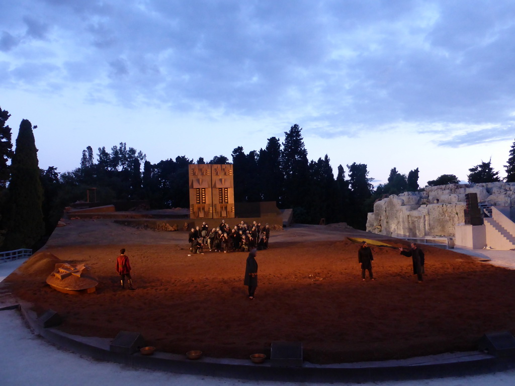 Chorus and herald at the stage of the Greek Theatre at the Parco Archeologico della Neapolis park, during the play `Agamemnon` by Aeschylus