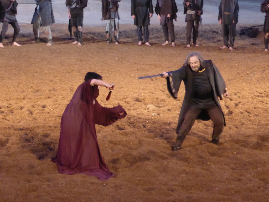 Clytemnestra fighting with the chorus at the stage of the Greek Theatre at the Parco Archeologico della Neapolis park, during the play `Agamemnon` by Aeschylus