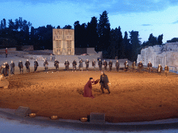 Clytemnestra fighting with the chorus at the stage of the Greek Theatre at the Parco Archeologico della Neapolis park, during the play `Agamemnon` by Aeschylus