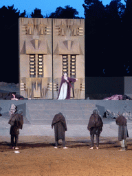Chorus, Clytemnestra and the corpses of Agamemnon and Cassandra at the gates of Argos at the stage of the Greek Theatre at the Parco Archeologico della Neapolis park, during the play `Agamemnon` by Aeschylus