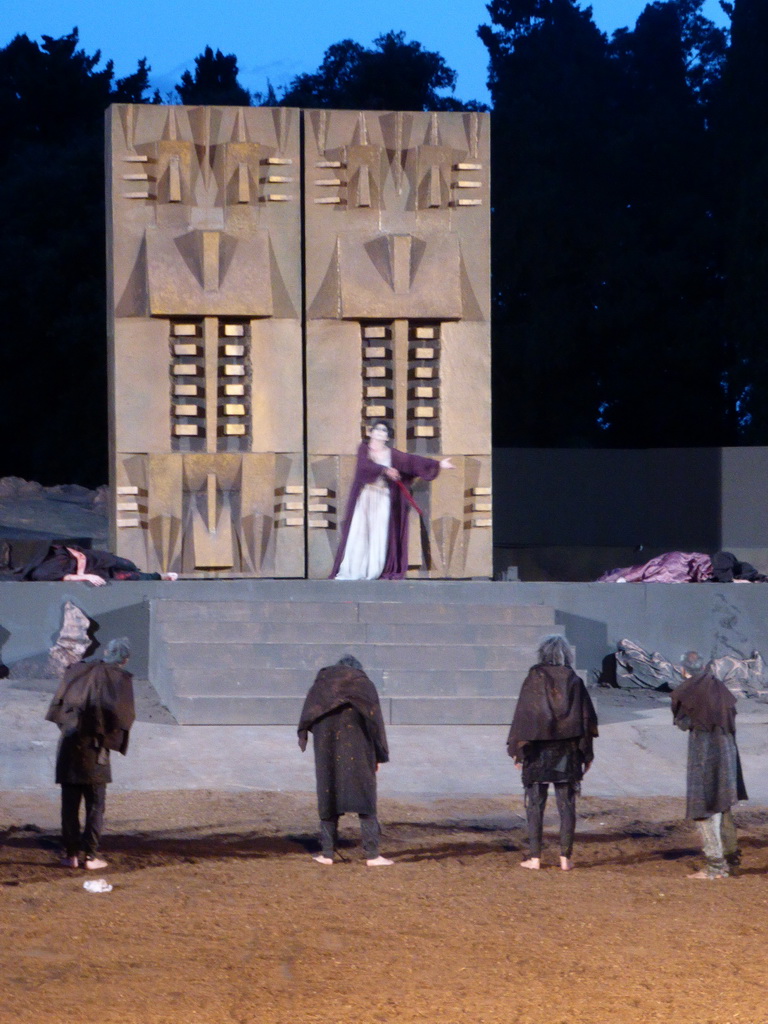 Chorus, Clytemnestra and the corpses of Agamemnon and Cassandra at the gates of Argos at the stage of the Greek Theatre at the Parco Archeologico della Neapolis park, during the play `Agamemnon` by Aeschylus