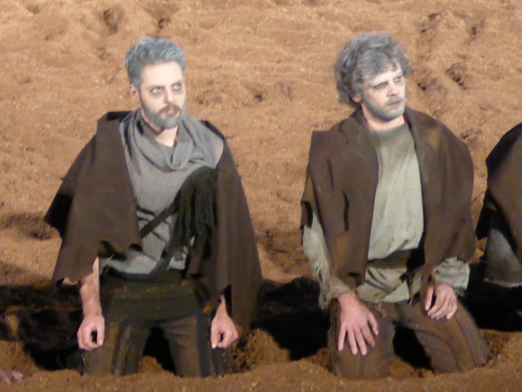 Chorus at the stage of the Greek Theatre at the Parco Archeologico della Neapolis park, during the play `Agamemnon` by Aeschylus